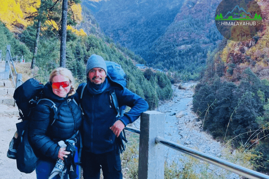 Adventure seekers trekking with backpacks in the Himalayas, ready to conquer Everest